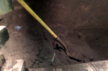 Once we discovered that the base of the chimney was behind a wall, we had to cut open the wall to clean out decades of compressed coal and No. 6 oil soot.