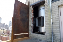 As a safety measure, the structural engineer designed this temporary steel barrier to protect the men and prevent anything from falling into the courtyard below. The liner has a large opening which will be connected with an adaptor to the liner below the offset.