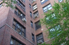 This multifamily building switched from No. 6 oil to natural gas, but installed a dual fuel burner for future fuel choice flexibility. © 2013 IntelliGreen Partners, LLC