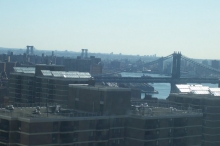 Solar PV Panels installed on the roof of a multifamily building in Lower Manhattan near the Brooklyn Bridge.