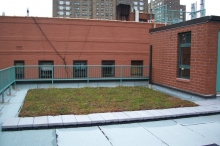 A Nursing Home on the Upper West Side of Manhattan. Solar PV Tiles installed flat onto roof. Three rain barrels and green roofs. Tenants on top floor report that they are less hot and more comfortable with green roof