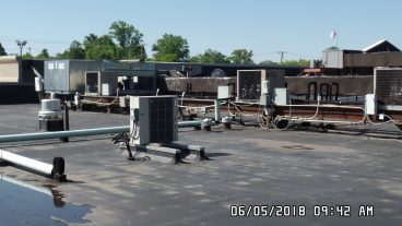 Four (4) rooftop units and exhaust fans.